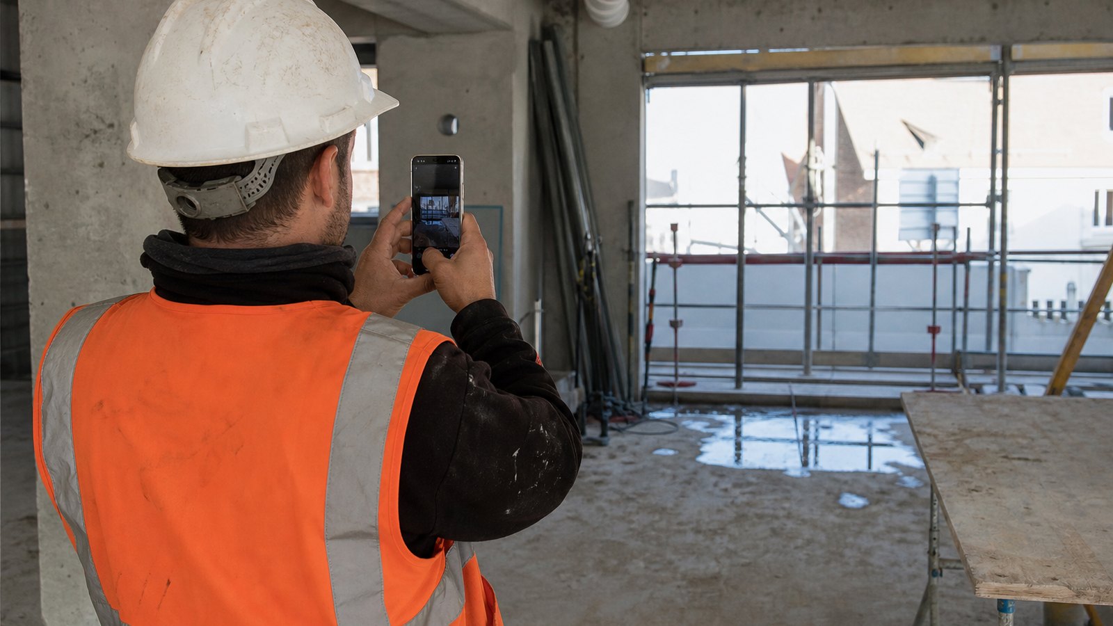 Prise d'une photo d'avancement sur un chantier